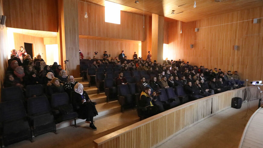 Syrians attend the screening of the Oscar nominated film "Last Men in Aleppo" at the university of Idlib, Idlib province, Syria, Feb. 12, 2018.