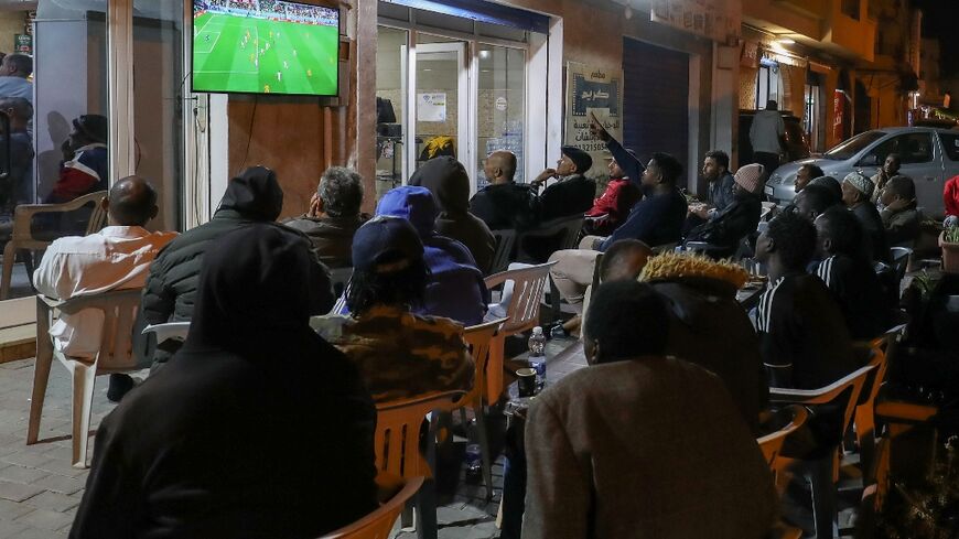 Libyans watch the Qatar 2022 World Cup Group A football match between Senegal and the Netherlands in Martyr's Square last week