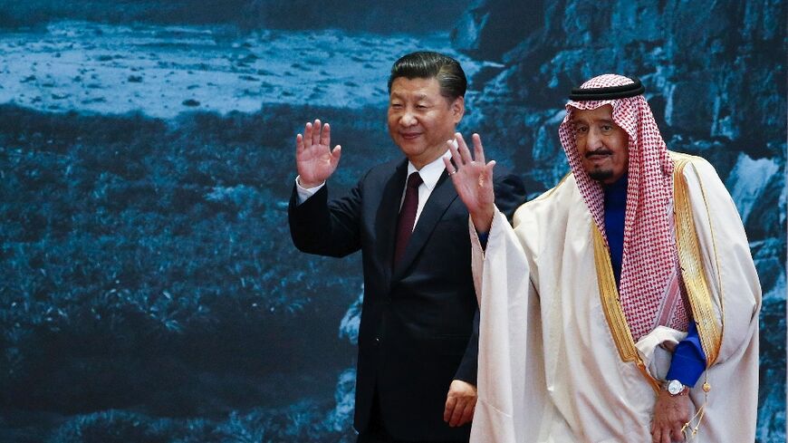Saudi Arabia's King Salman is seen with Chinese President Xi Jinping during a visit to Beijing in March 2017