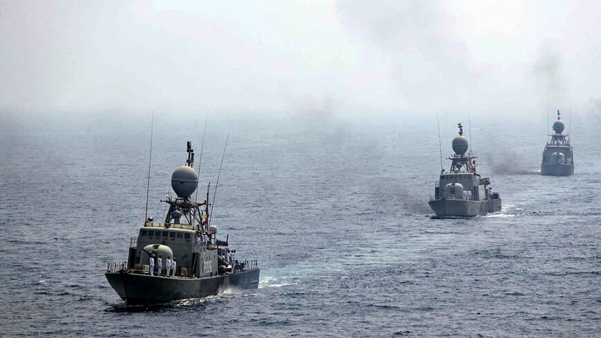 A handout picture provided by the Iranian Army official website on Sept. 12, 2020, shows Iranian naval ships parading during the last day of a military exercise in the Gulf, near the strategic strait of Hormuz in southern Iran. 