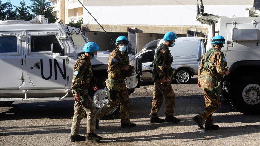 Italian members of the United Nations Interim Force in Lebanon gather in the village of Seddiqine, from near where four rockets were fired toward Israel, Tyre district, south Lebanon, May 19, 2021.