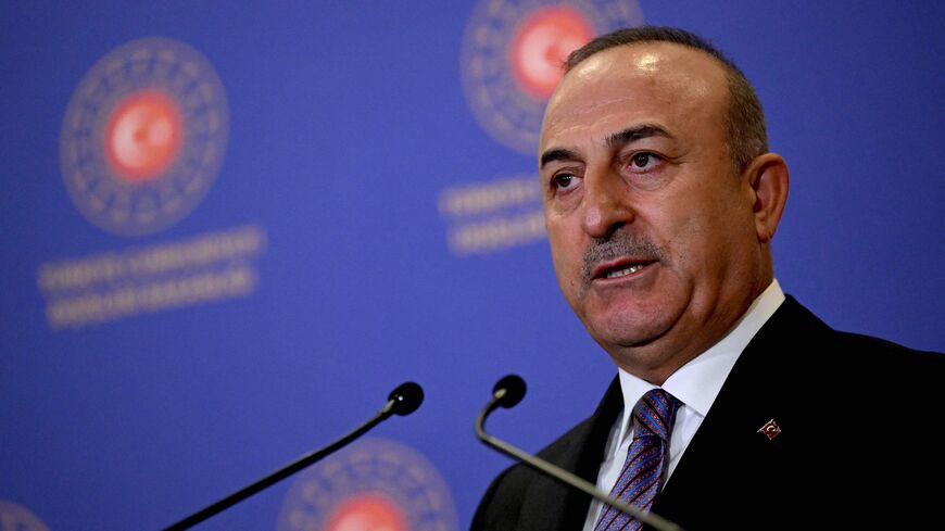 Turkish Foreign Minister Mevlut Cavusoglu addresses a press conference with the NATO Secretary General after their meeting at The Foreign Ministry in Istanbul on Nov. 3, 2022. 