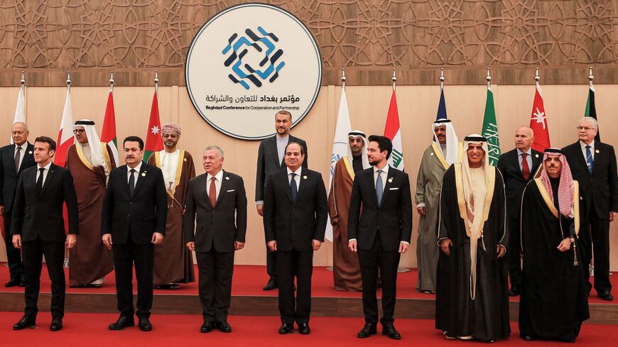 Dignitaries pose together in a family photo at the start of the Baghdad Conference for Cooperation and Partnership. 