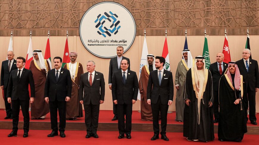 Dignitaries pose together in a photo at the start of the Baghdad Conference for Cooperation and Partnership.