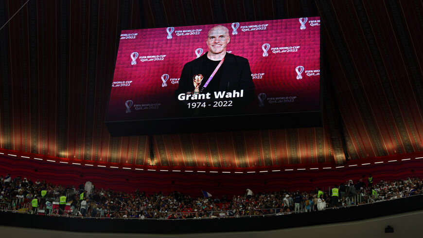 The LED board shows a photo of Grant Wahl, an American sports journalist who passed away whilst reporting on the Argentina and Netherlands match, prior to the FIFA World Cup Qatar 2022 quarter final match between England and France at Al Bayt Stadium on December 10, 2022 in Al Khor, Qatar. (Photo by Julian Finney/Getty Images)