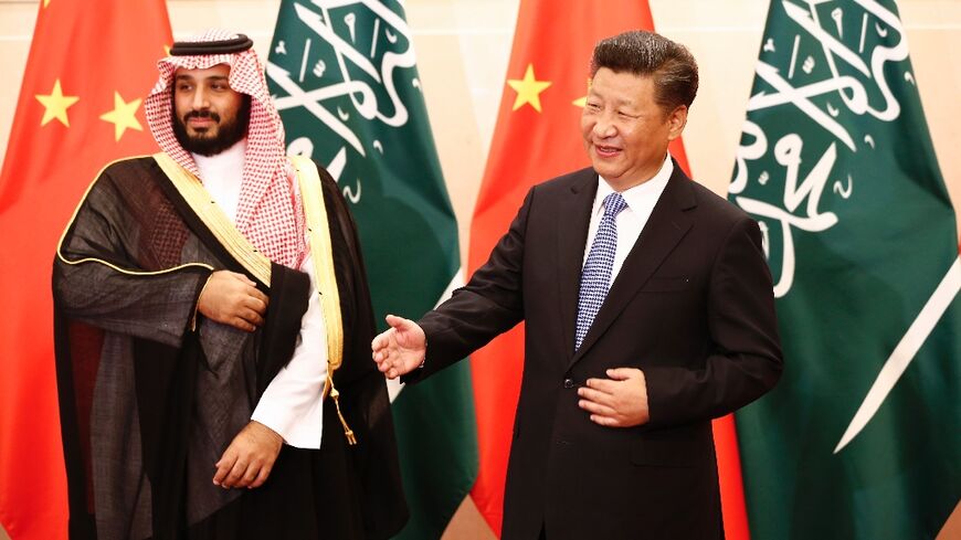 Chinese President Xi Jinping arrives in Saudi Arabia on Wednesday for three days of meetings: in this 2016 photograph he greets Crown Prince Mohammed bin Salman in Beijing