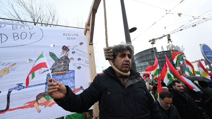 Police said some 12,000 people took part in the demonstration which marched towards the parliament where a monthly plenary session was being held