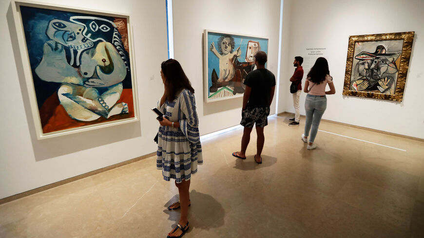 Visitors look at paintings by Spanish artist Pablo Picasso displayed at the Sursock Museum, Beirut, Lebanon, Sept. 27, 2019.