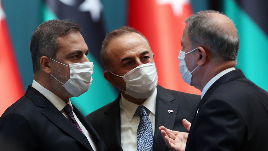 Turkish Foreign Minister Mevlut Cavusoglu (C), Turkish Defense Minister Hulusi Akar (R) and head of the Turkish Intelligence Organization Hakan Fidan (L).