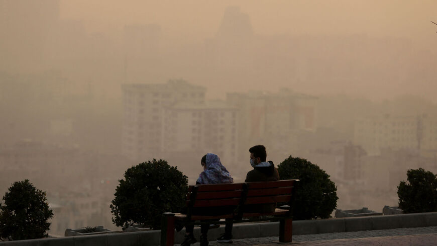 Smog obscures the view from the Saad Abad mountain north of the Iranian capital, Tehran.