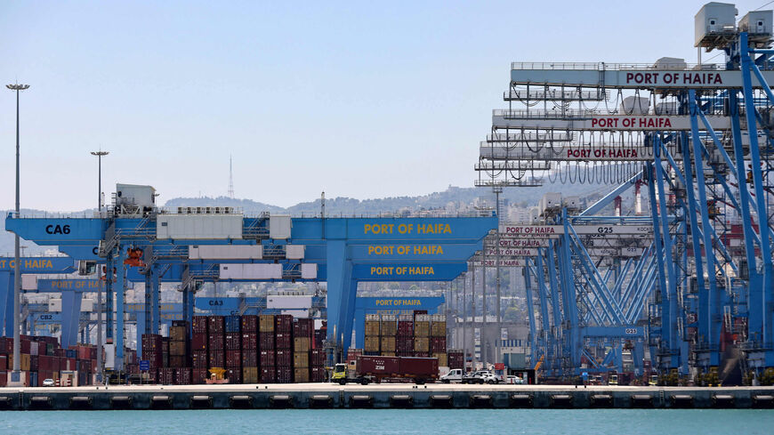 This picture shows countainers and cranes on a dock at Haifa Port, Israel, June 24, 2021.