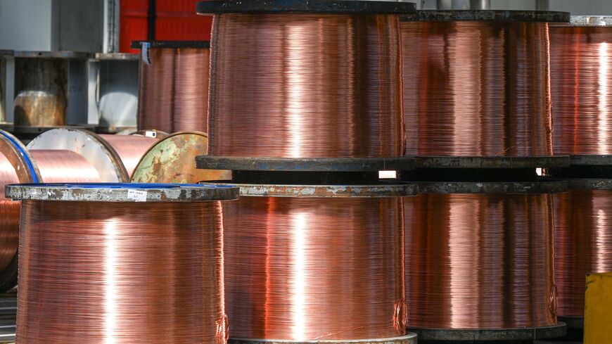 This photograph shows rolls of copper wires stored at the Nexans manufacture in Lens, northern France, on May 11, 2022. - The French cable company is the only one in its sector to have its own copper foundry in Lens. This plant represents a competitive advantage for Nexans at the dawn of an explosion in demand for electrical cables. (Photo by DENIS CHARLET / AFP) (Photo by DENIS CHARLET/AFP via Getty Images)