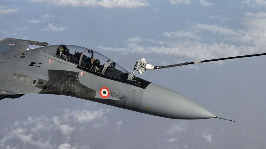 Indian Air Force (IAF) Russian-made Sukhoi Su-30MKI fighter jet takes part in an air refueling exercise from a French Air and Space Force (FASF). Russia is reportedly mulling sale of Sukhoi fighter jets to Iran.  (Photo by EMMANUEL DUNAND/AFP via Getty Images)