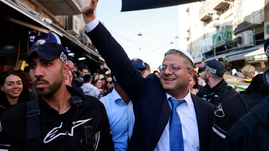Itamar Ben Gvir, Israel's new Minister of National Security and leader of the far-right Otzma Yehudit (Jewish Power) party, greets supporters during a visit to Jerusalem's Mahane Yehuda market on Dec. 30, 2022. 
