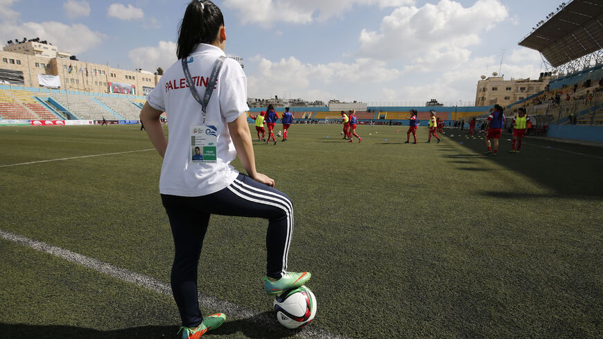 Palestinian female soccer players are seen before a qualifying match against Thailand for the Asian Women Football Cup, al-Ram, West Bank, April 3, 2017.