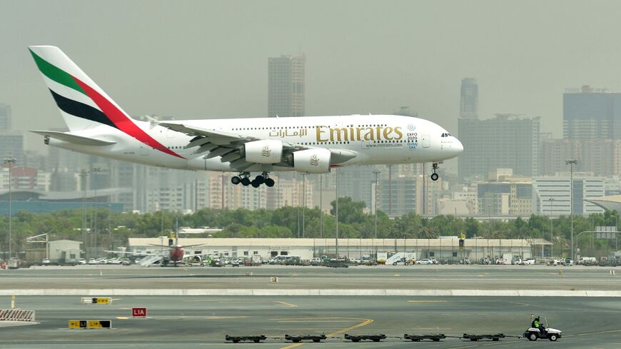 A picture take on Sept. 14, 2017 shows an Airbus A380 of Emirates landing at the tarmac at Dubai's International Airport. 