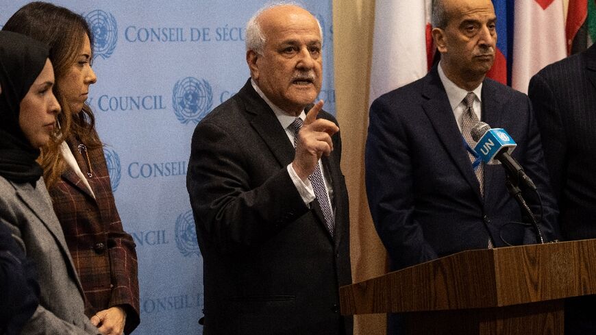 Riyad Mansour, the Palestinian envoy to the UN, addresses the media following a declaration by the UN Security Council expressing 'dismay' at continued Israeli settlements in Palestinian lands