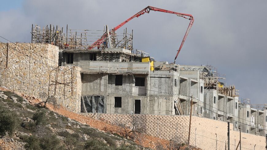 Building work proceeds apace at the Israeli settlement of Migdalim in the occupied West Bank, part of a policy that has prompted Western criticism of the hardline government that took power in December