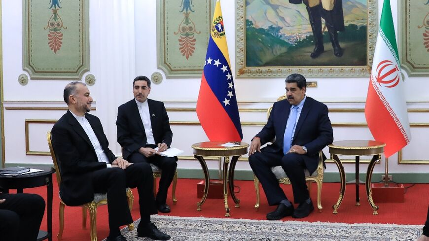 Venezuelan President Nicolas Maduro (R) meets with Iranian Foreign Minister Hossein Amir-Abdollahian (L) at the presidential palace in Caracas on February 3, 2023  