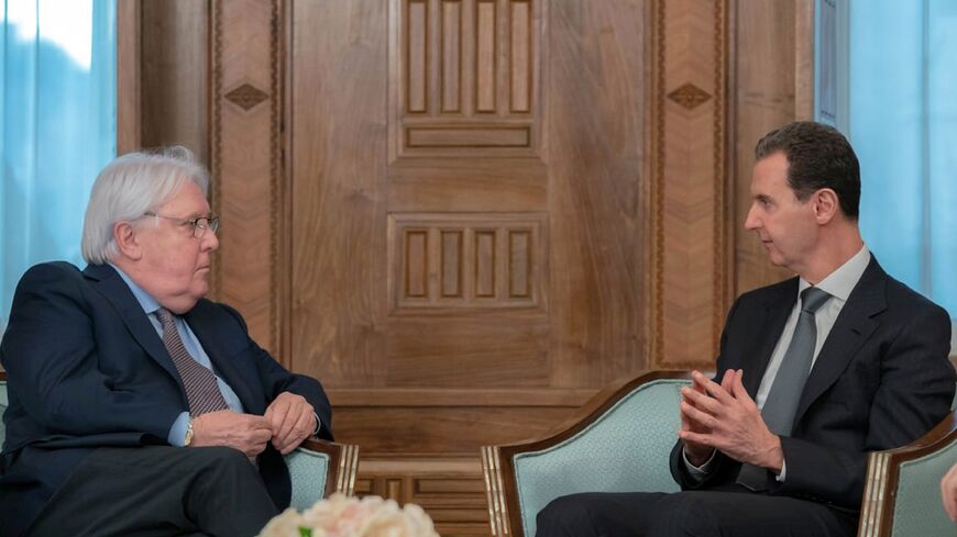 This handout picture released by the official Syrian Arab News Agency (SANA) shows Syria's President Bashar al-Assad (R) meeting with Martin Griffiths (L), the UN Under-Secretary-General for Humanitarian Affairs and Emergency Relief Coordinator