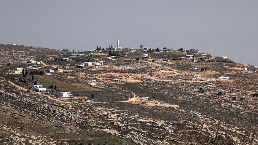 A picture taken from the Palestinian village of Aqraba shows the Israeli settlement outpost of Gevat Arnon, near Nablus city in the southern  occupied West Bank