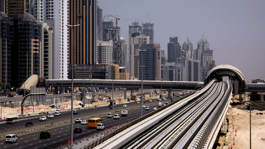 The Dubai metro track is seen along Dubai's Shiekh Zayed road on September 09, 2009, as the UAE opens its new metro network in a bid to cut dependency on cars and ease congestion. Dubai is the first city in the oil-rich Gulf to introduce rail as a commuting option. (Photo by KARIM SAHIB/AFP via Getty Images)