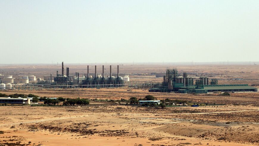 A picture taken on September 24, 2020 shows the Brega oil port in Marsa Brega, some 270kms west of Libya's eastern city of Benghazi. - Libyas state oil firm lifted force majeure on what it deemed secure oil ports and facilities on September 20, a day after strongman Khalifa Haftar said he was lifting a blockade on oilfields and ports. The blockade, which has resulted in more than $9.8 billion in lost revenue according to the state-run National Oil Corporation (NOC), has exacerbated electricity and fuel shor