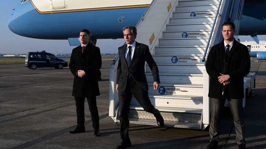 US Secretary of State Antony Blinken (C) disembarks his plane at Paris-Le Bourget Aiport, north of Paris as he arrives for his visit to Paris, on March 8, 2022. (Photo by OLIVIER DOULIERY/Pool/AFP via Getty Images)