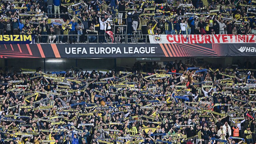 Fenerbahce supporters cheer during the UEFA Europa League group B football match between Fenerbahce SK and Stade Rennais FC at the Ulker stadium, in Istanbul on Oct. 27, 2022.