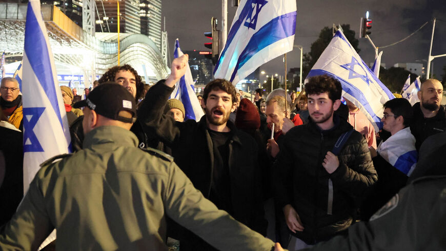 Israeli protesters attend a rally against Prime Minister Benjamin Netanyahu's new hard-right government, Tel Aviv, Israel, Feb. 4, 2023.