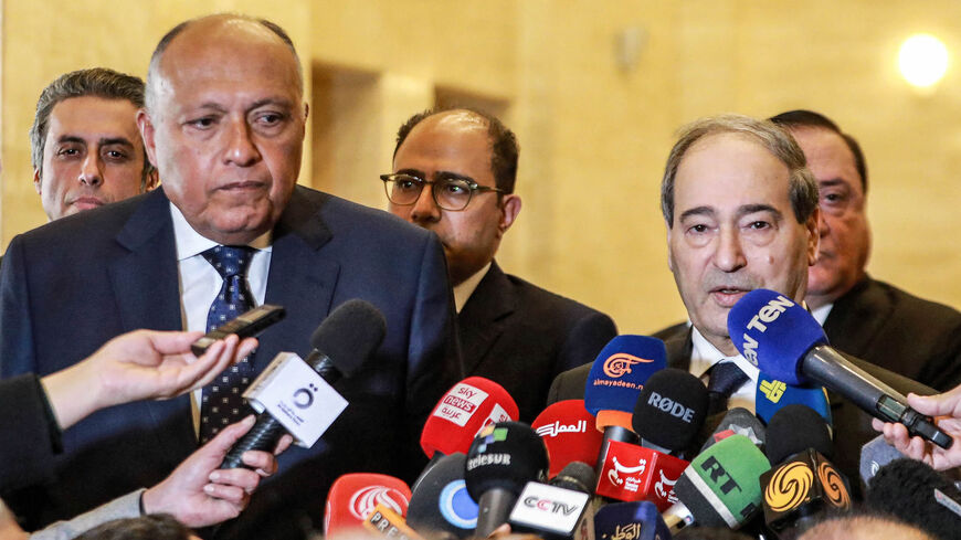 Egyptian Foreign Minister Sameh Shoukry (L) and Syrian Foreign Minister Faisal Mekdad (R) give a press conference at the Foreign Ministry headquarters, Damascus, Syria, Feb. 27, 2023.