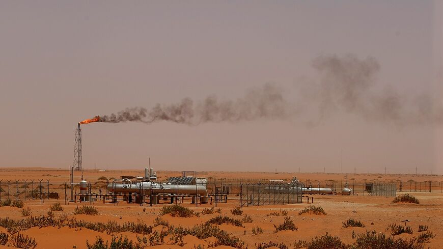 A flame from a Saudi Aramco oil installion known as "Pump 3" is seen in the desert near the oil-rich area of Khouris, 160 kms east of the Saudi capital Riyadh, on June 23, 2008.  (Photo credit MARWAN NAAMANI/AFP via Getty Images)