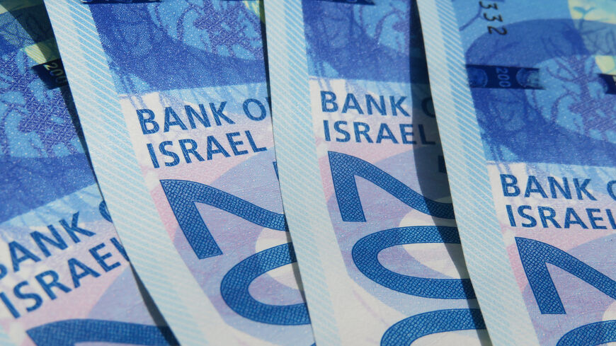 New banknotes of Israel background.