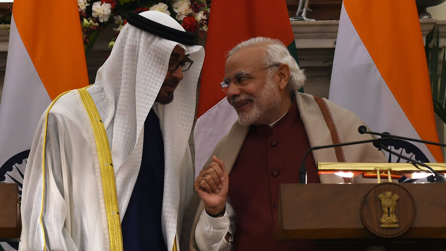 Indian Prime Minister Narendra Modi (R) shares a light moment with Abu Dhabi's Crown Prince Sheikh Mohammed bin Zayed al-Nahyan at Hyderabad House in New Delhi on February 11, 2016. The crown prince is on a three-day state visit to India until February 12. AFP PHOTO / Money SHARMA / AFP / MONEY SHARMA (Photo credit should read MONEY SHARMA/AFP via Getty Images)