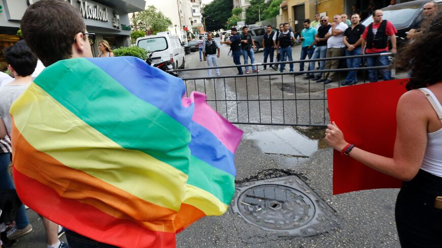 Activists from of the Lebaanon’s LGBTQ community take part in a protest outside police station in Beirut on May 15, 2016, demanding the release of four transsexual women and calling for the abolishment of article 534 of the Lebanese Penal code, which prohibits having sexual relations that "contradict the laws of nature". (ANWAR AMRO/AFP via Getty Images)