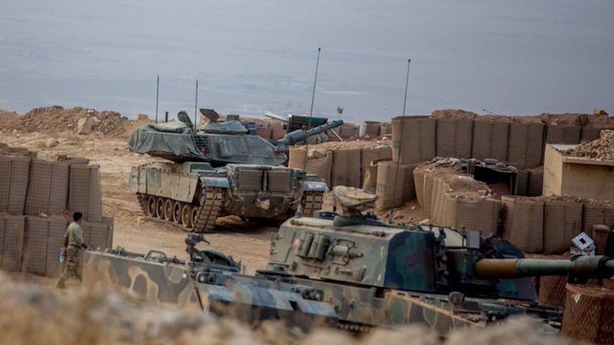 Turkish tanks are positioned in the Turkish military base in Bashiqa, several kilometers outside of Mosul, Iraq.