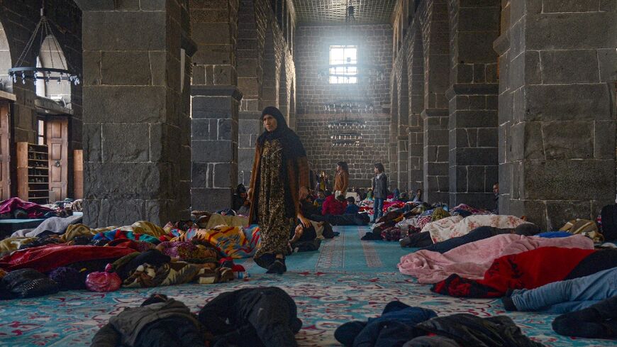 Dozens of families that fled Syria's civil war are taking shelter from Turkey's earthquake in Diyarbakir's ancient mosque