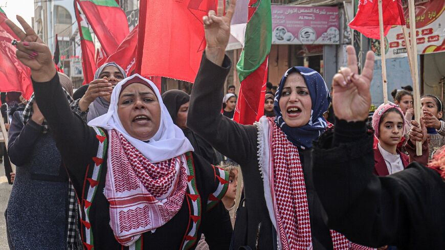 Democratic Front for the Liberation of Palestine (DFLP) supporters rally in Rafah in the Gaza Strip against the Aqaba summit