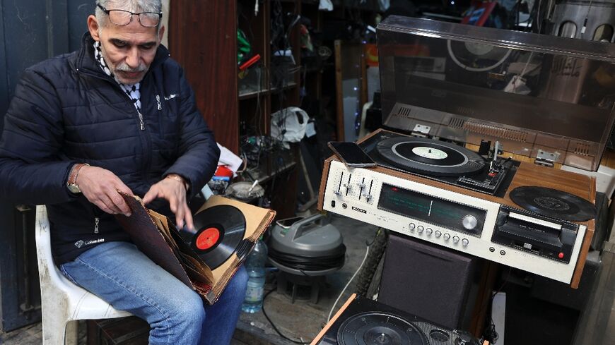 Palestinian Jamal Hemou, 58, is the last of his kind -- he runs the only store in the West Bank city of Nablus repairing and selling vinyl records and players