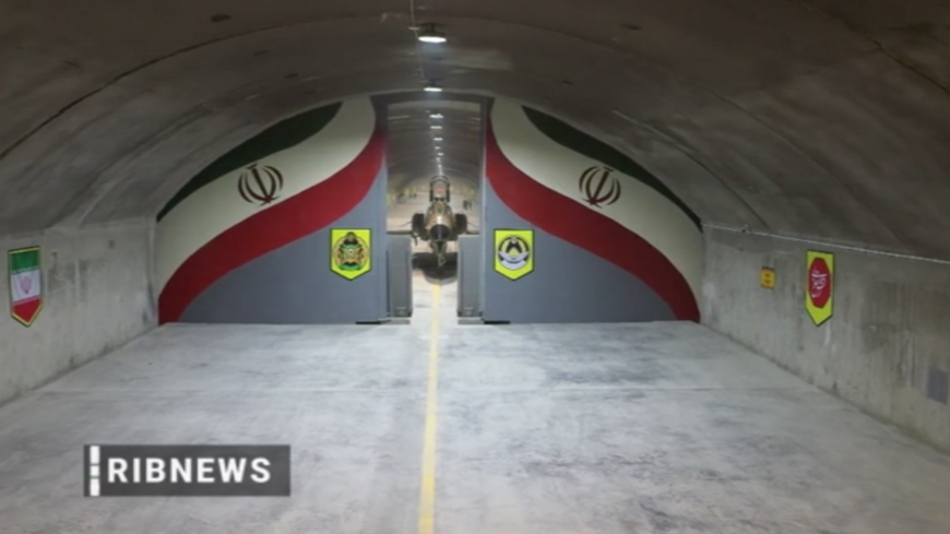 Part of an underground airbase is seen in a news report by the state broadcaster aired Feb. 7, 2023.