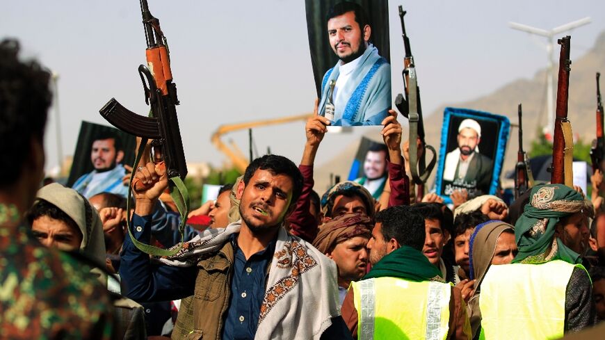 Yemen's Iran-backed Huthi rebels rally in the capital Sanaa last June. Analysts warn that a thaw in relations between Tehran and the embattled government's main backer Riyadh is no "magic wand" for peace