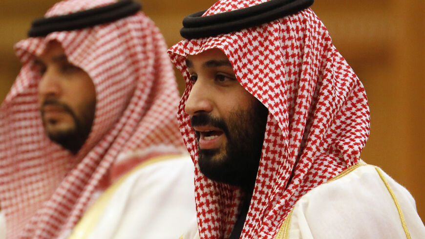 Saudi Crown Prince Mohammed bin Salman (R) attends a meeting with Chinese President Xi Jinping (not pictured) at the Great Hall of the People in Beijing on February 22, 2019. (Photo by HOW HWEE YOUNG / POOL / AFP) (Photo credit should read HOW HWEE YOUNG/AFP via Getty Images)