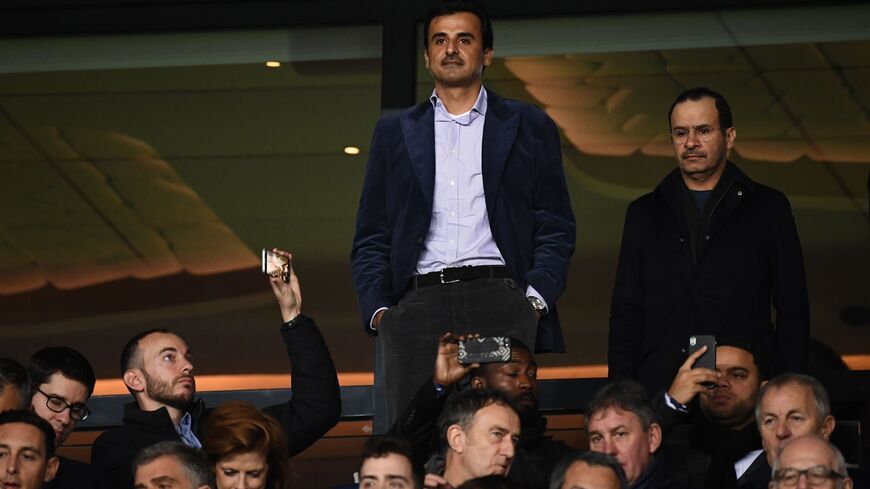 Qatar's Emir and Paris Saint-Germain owner Tamim bin Hamad Al-Thani (C) looks on during the UEFA Champions League round of 16 second-leg football match between Paris Saint-Germain (PSG) and Manchester United at the Parc des Princes stadium in Paris on March 6, 2019. (Photo by FRANCK FIFE / AFP) (Photo credit should read FRANCK FIFE/AFP via Getty Images)