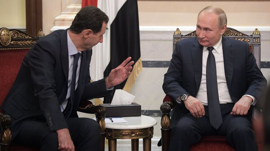 Russian President Vladimir Putin and Syrian President Bashar al-Assad hold a meeting in Damascus on January 7, 2020. - Putin met his Syrian counterpart Bashar al-Assad during an unprecedented visit to Damascus as the prospect of war between Iran and the United States loomed over the region. (Photo by Alexey DRUZHININ / SPUTNIK / AFP) (Photo by ALEXEY DRUZHININ/SPUTNIK/AFP via Getty Images)