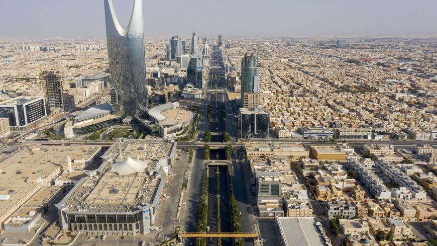 An aerial view shows the Kingdom Centre skyscraper (Kingdom Tower) and the King Fahad road in the Saudi capital Riyadh, on May 24, 2020. (Photo by FAISAL AL-NASSER/AFP via Getty Images)