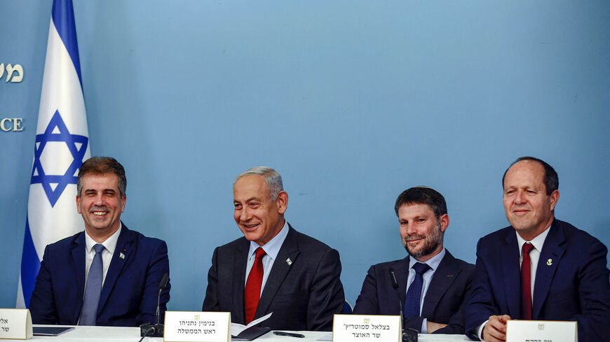 Israeli Foreign Minister Eli Cohen, Prime Minister Benjamin Netanyahu, Finance Minister Bezalel Smotrich and Economy Minister Nir Barkat look on during a press conference at the prime minister's office, Jerusalem, Jan. 25, 2023.
