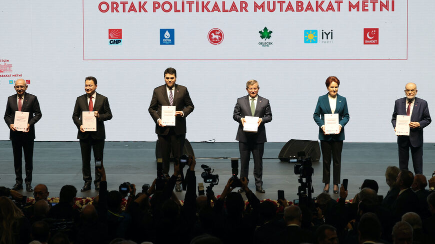 Republican People's Party (CHP) Kemal Kilicdaroglu (L), IYI Party Meral Aksener (2ndR), Felicity Party (Saadet) Temel Karamollaoglu (R), Democratic Party (DP) Gultekin Uysal (3rdL), Future Party (Gelecek) Ahmet Davutoglu (3rdR), and Democracy and Progress (DEVA) Party Ali Babacan (2ndL), belonging to the Turkish opposition alliance called National Alliance, pose on stage before presenting their programme, in Ankara, on January 30, 2023. (Photo by Adem ALTAN / AFP) (Photo by ADEM ALTAN/AFP via Getty Images)
