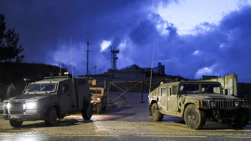 Israeli armored military vehicles and humvees patrol along the border with Lebanon near the northern kibbutz of Bar'am, Israel, March 15, 2023.