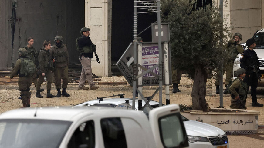 Israeli security forces patrol the town of Huwara following a shooting attack on an Israeli vehicle in the area, West Bank, March 19, 2023.