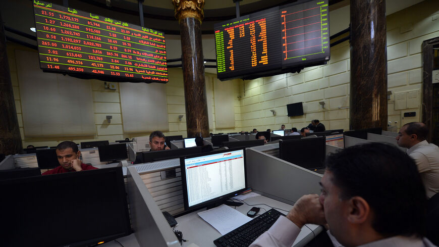 A stock market broker works at the Egyptian Stock Exchange, Cairo, Egypt, Jan. 6, 2013.